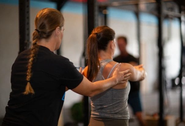 SEMI-PRIVATE PERSONAL TRAINING 2 PUSH! Personal Training Coach helping with Form